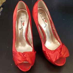 Luichiny red heels with bow